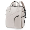 Beige diaper bag backpack with front zip pockets
