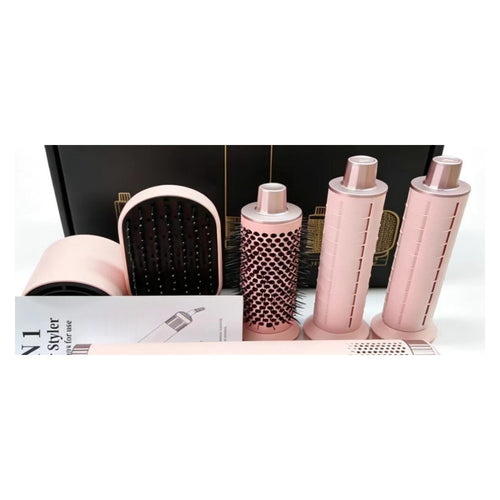 The five attachments of the hot air styler: dryer nozzle, paddle smoothing brush, round bristle brush and two curling barrels